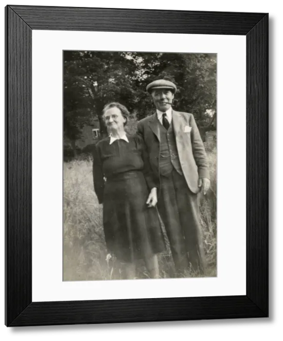 Framed Print : Smiling older couple, c. 1950s Framed Print : Smiling older couple, c. 1950s