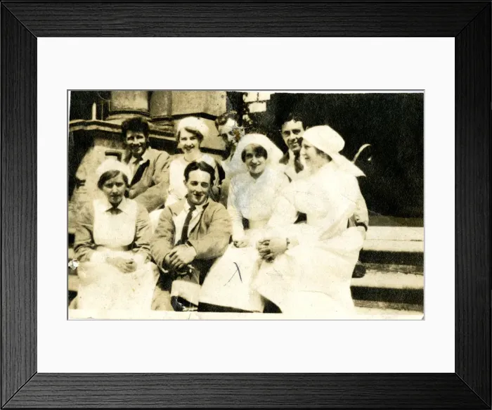 Framed Print : Four nurses and wounded servicemen on steps Framed Print : Four nurses and wounded servicemen on steps