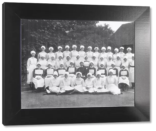 Formal group of matron, nurses and sister outdoors