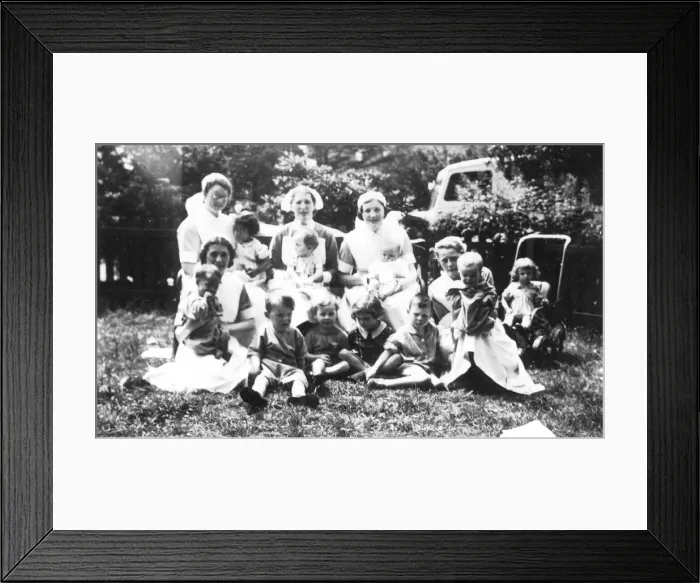 Framed Print : Informal outdoor group of nurses and children Framed Print : Informal outdoor group of nurses and children