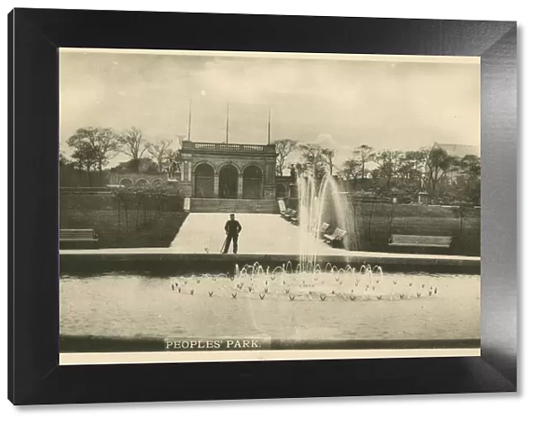 11999779. Peoples Park, Halifax, Yorkshire, with a fountain in the foreground.. circa 1900