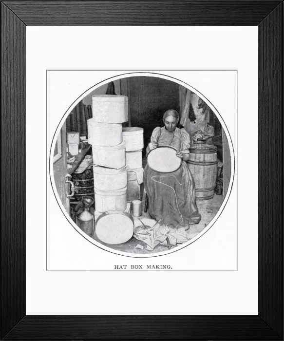 Framed Print : Woman sitting in her own home in South London, making the hat boxes for a supplier that Framed Print : Woman sitting in her own home in South London, making the hat boxes for a supplier that