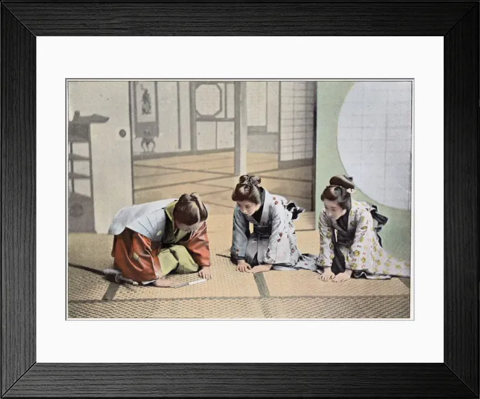 Framed Print : A Japanese lady welcomes two visitors into her home Date: 1890S Framed Print : A Japanese lady welcomes two visitors into her home Date: 1890S