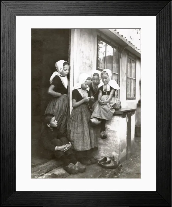 Framed Print : A group of Dutch fisherchildren, four girls and a boy, wearing traditional costumes Framed Print : A group of Dutch fisherchildren, four girls and a boy, wearing traditional costumes