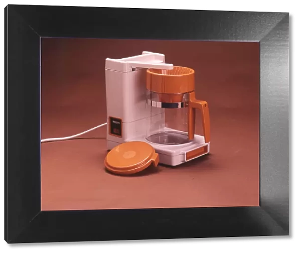 A Philips food blender or liquidiser in a trendy shade of 70s orange