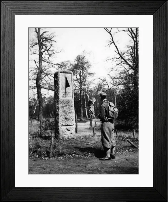 Framed Print : A rambler in plus fours reads the inscription on the sundial monument to daylight saving Framed Print : A rambler in plus fours reads the inscription on the sundial monument to daylight saving