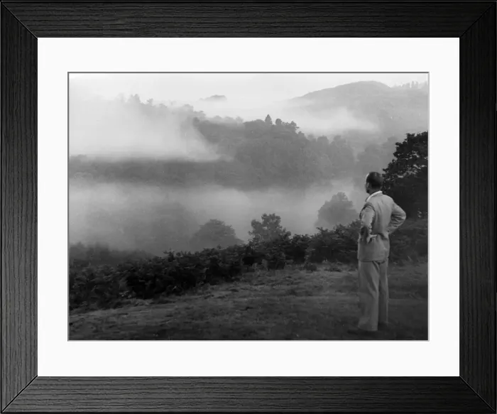 Framed Print : A man in a suit stops to look at the impressive morning mist over Grasmere, Lake District Framed Print : A man in a suit stops to look at the impressive morning mist over Grasmere, Lake District