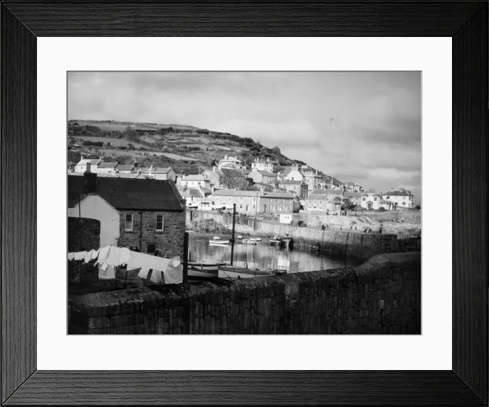 Framed Print : The pretty harbour at Mousehole, Cornwall, England. Once called Porth Enyn Framed Print : The pretty harbour at Mousehole, Cornwall, England. Once called Porth Enyn