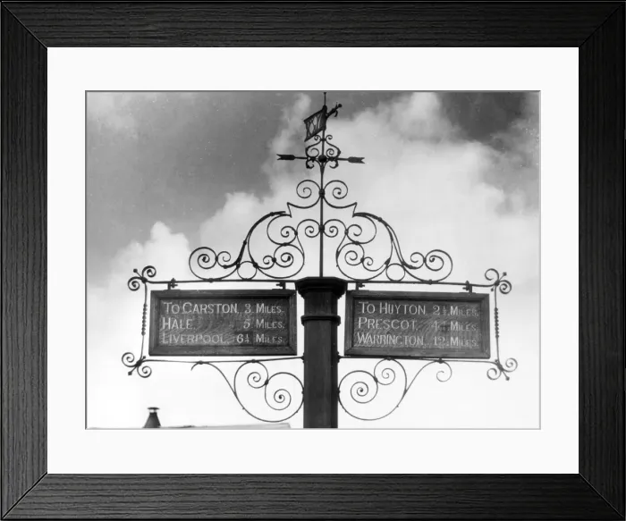 Framed Print : Elaborate wrought iron signposts at Gateacre, Merseyside, England. Date: 1950s Framed Print : Elaborate wrought iron signposts at Gateacre, Merseyside, England. Date: 1950s