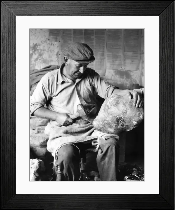 Framed Print : The Flint Knapper, at Brandon, Suffolk, England. This ancient craft is still continued Framed Print : The Flint Knapper, at Brandon, Suffolk, England. This ancient craft is still continued