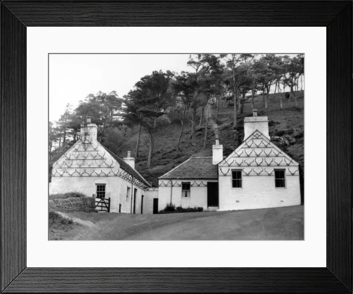 Framed Print : A curious old blacksmiths shop and cottage, decorated with dozens of deer Framed Print : A curious old blacksmiths shop and cottage, decorated with dozens of deer