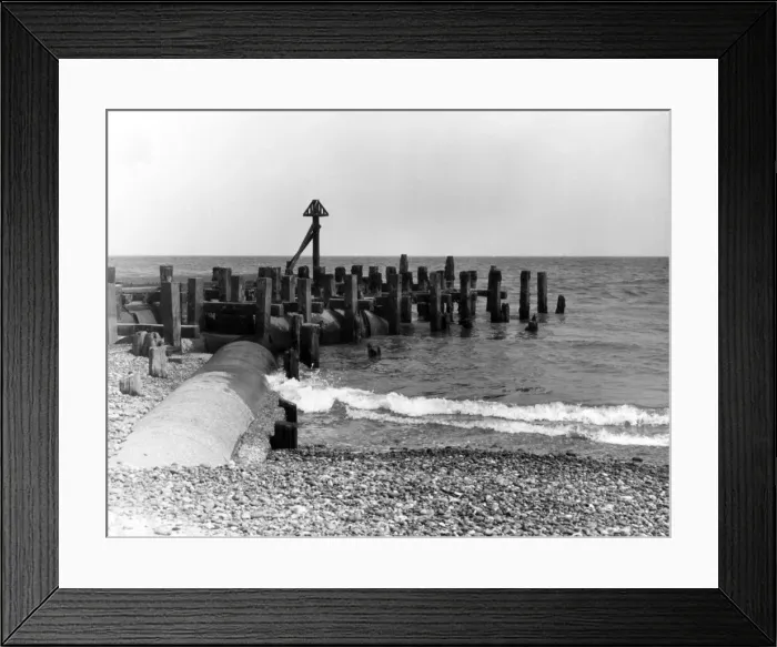 Framed Print : Sewage sluice pipes, the cause if sea pollution on the beach at Minsmere, Suffolk Framed Print : Sewage sluice pipes, the cause if sea pollution on the beach at Minsmere, Suffolk