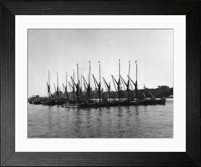 Framed Print : Coasting barges at their moorings on the River Thames, near Greenwich, London, England Framed Print : Coasting barges at their moorings on the River Thames, near Greenwich, London, England