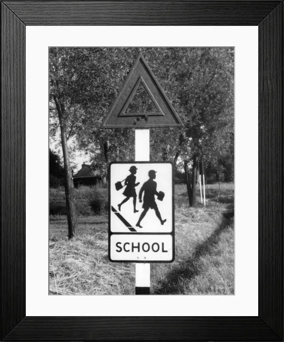 Framed Print : School - the pictorial traffic sign which replaced a former torch sign Framed Print : School - the pictorial traffic sign which replaced a former torch sign