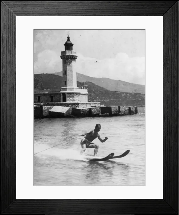 Framed Print : American champion water skier AZEY (?) RUTHERFORD in action! Date: 1930s Framed Print : American champion water skier AZEY (?) RUTHERFORD in action! Date: 1930s