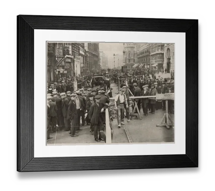 Framed Print : Disruption in Piccadilly, London, with crowds of people watching work being done on part Framed Print : Disruption in Piccadilly, London, with crowds of people watching work being done on part