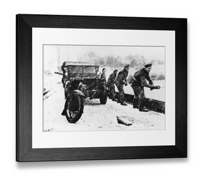 Framed Print : Polish soldiers crossing a river while towing a Jeep in bad weather on the Western Front Framed Print : Polish soldiers crossing a river while towing a Jeep in bad weather on the Western Front