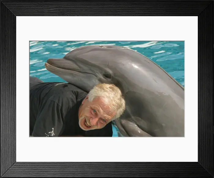 Framed Print : Portait of photographer Leandro A. Stanzani with Dolphin Framed Print : Portait of photographer Leandro A. Stanzani with Dolphin
