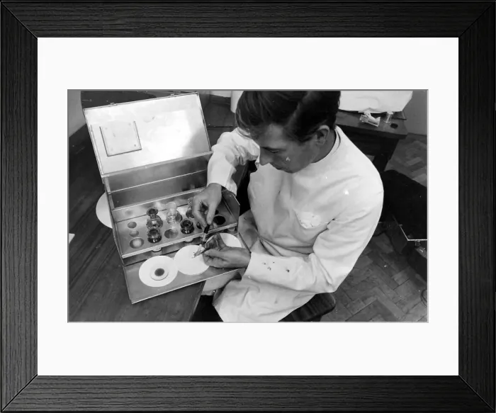 Framed Print : Scientist examining and testing a locust at the Anti-Locust Research Centre (ALRC) Framed Print : Scientist examining and testing a locust at the Anti-Locust Research Centre (ALRC)