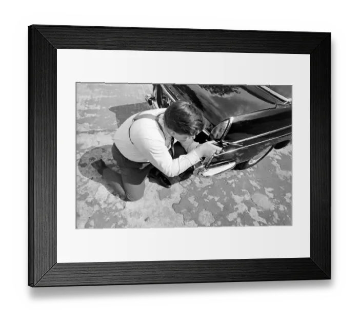 Framed Print : Policeman aiming his gun round the side of a car during training at the Police Gun School Framed Print : Policeman aiming his gun round the side of a car during training at the Police Gun School