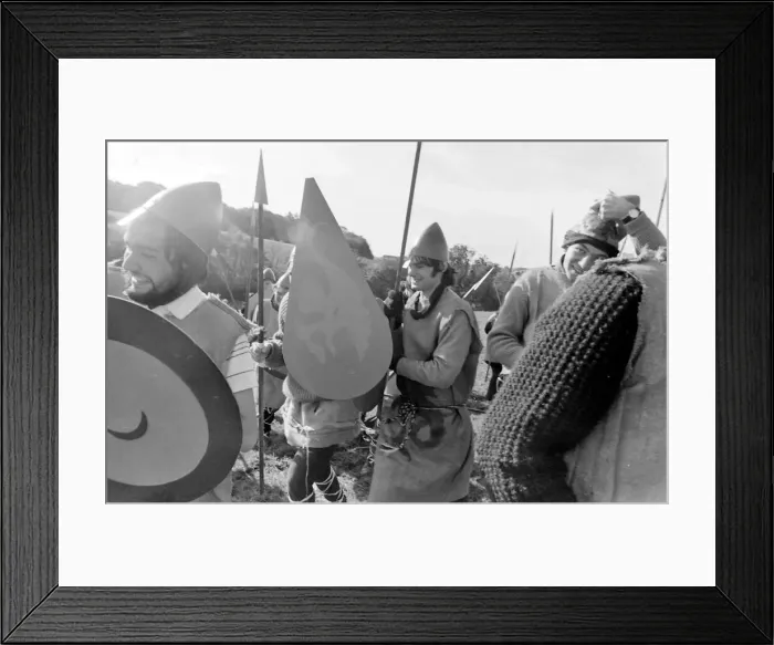 Framed Print : Battle of Hastings re-enactment. With cross-gartered jeans and dyed sackcloth doublets Framed Print : Battle of Hastings re-enactment. With cross-gartered jeans and dyed sackcloth doublets