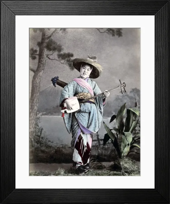Framed Print : Street singer, Japan circa 1880s. Date: circa 1880s