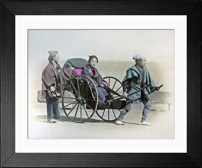 Framed Print : Girl in rickshaw, Japan, circa 1880s. Date: circa 1880s Framed Print : Girl in rickshaw, Japan, circa 1880s. Date: circa 1880s