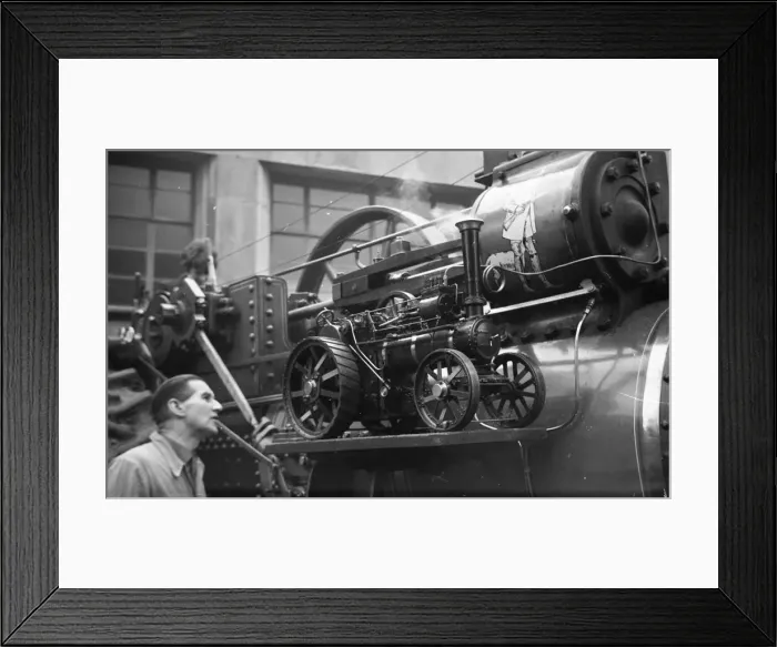 Framed Print : Traction engine model on running board of a full size engine Framed Print : Traction engine model on running board of a full size engine