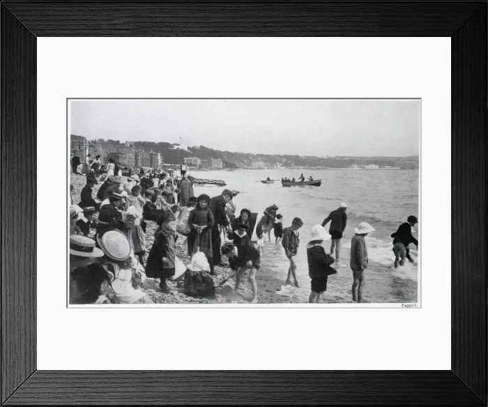 Framed Print : Children on the sands in a wide assortment of clothing Date: 1905 Framed Print : Children on the sands in a wide assortment of clothing Date: 1905