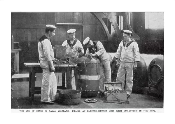 Filling an electro-contact mine with gun-cotton in the Navy. Date: August 1914