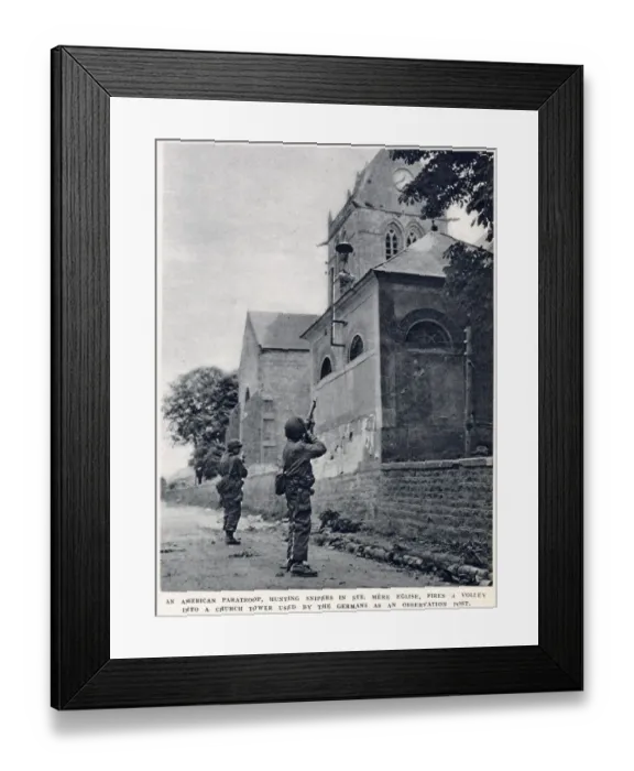 Framed Print : American paratroop, hunting snipers in St. Mere Eglise, firing a volley into a church Framed Print : American paratroop, hunting snipers in St. Mere Eglise, firing a volley into a church