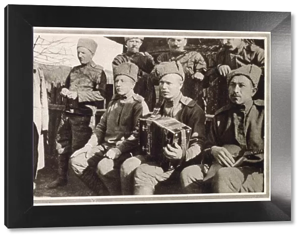 A group of Russian soldiers in camp accompanied by their musical instruments