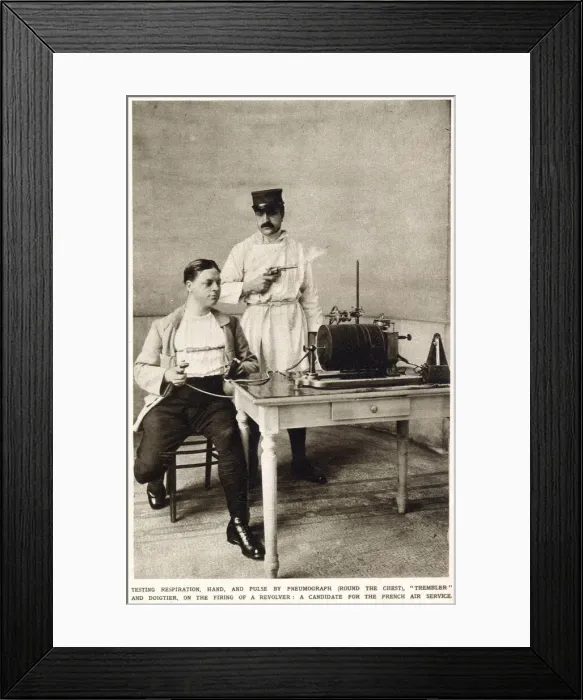 Framed Print : A seated candidate for the French Air Service is subjected to a series of tests to gauge Framed Print : A seated candidate for the French Air Service is subjected to a series of tests to gauge