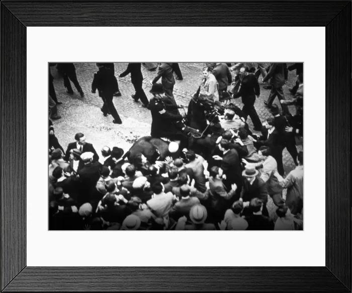 Framed Print : Policeman on horseback with an unruly crowd Framed Print : Policeman on horseback with an unruly crowd