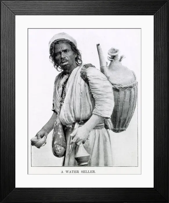 Framed Print : Egyptian man selling water from a clay jug on his back in Cairo, Egypt Framed Print : Egyptian man selling water from a clay jug on his back in Cairo, Egypt