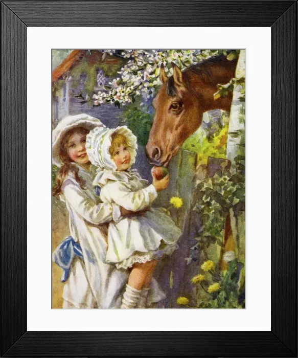 Framed Print : Child feeding a pony Framed Print : Child feeding a pony