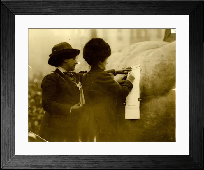 Framed Print : Two suffragettes signing a petition Framed Print : Two suffragettes signing a petition