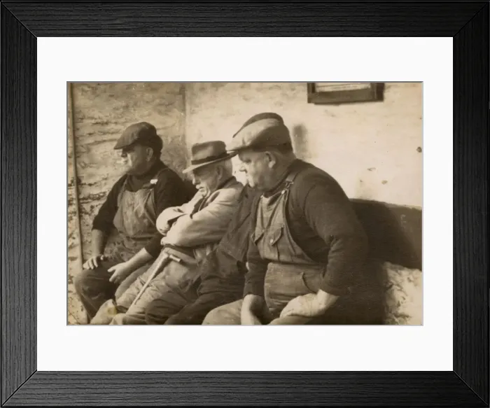 Framed Print : Four workmen sitting on a bench Framed Print : Four workmen sitting on a bench