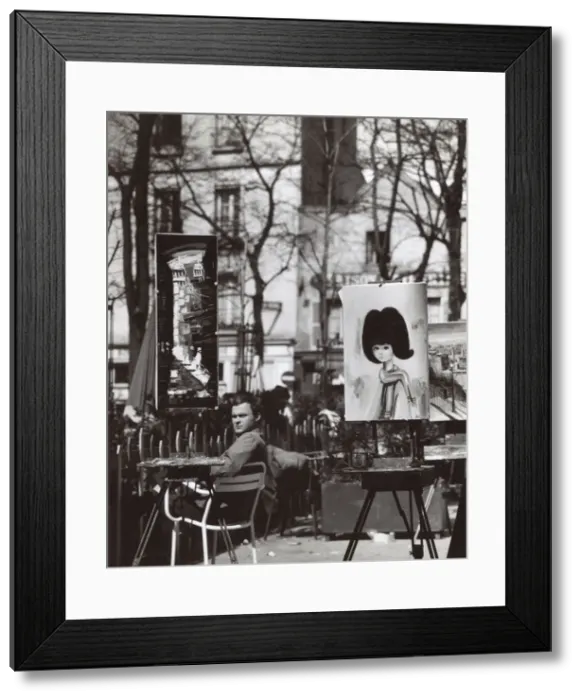 Framed Print : Street artist and paintings in the Place du Tertre, Paris Framed Print : Street artist and paintings in the Place du Tertre, Paris