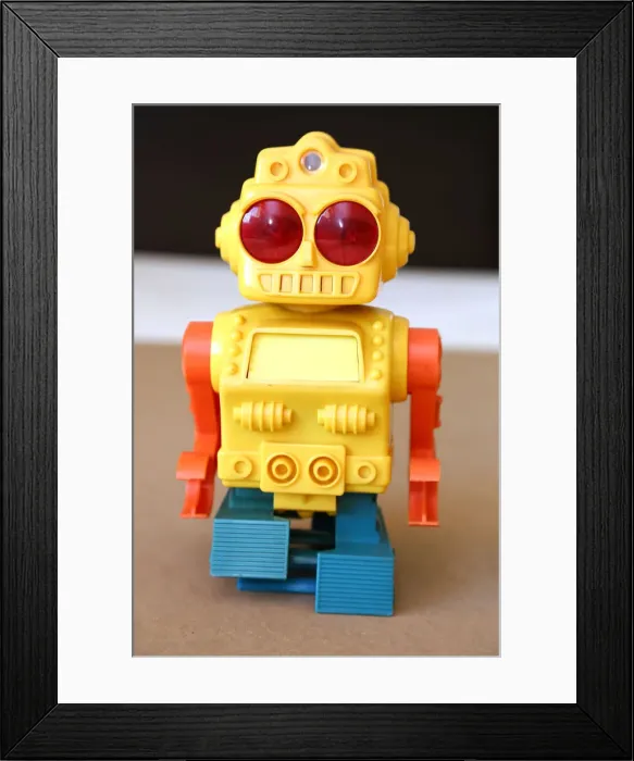 Framed Print : Retro Toy Walking Plastic Robot - Yellow Body (3 / 3) Framed Print : Retro Toy Walking Plastic Robot - Yellow Body (3 / 3)