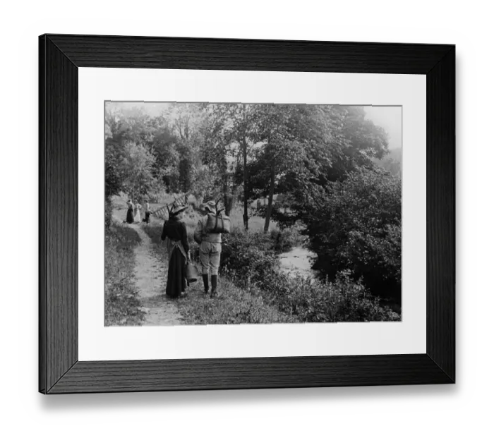 Framed Print : Couple strolling by riverside, 1890s Framed Print : Couple strolling by riverside, 1890s
