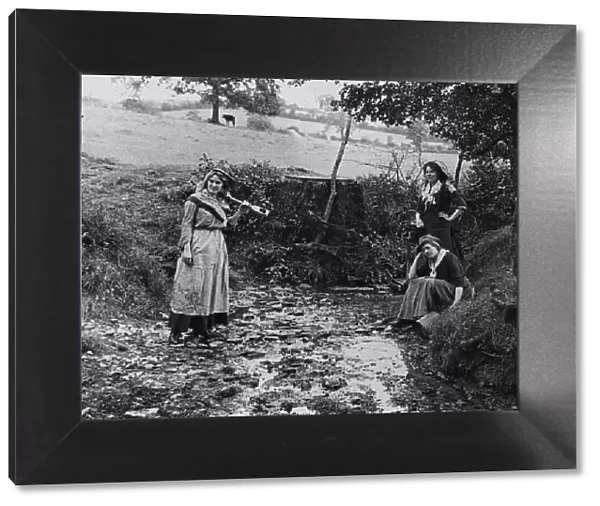 Women by a brook, 1890s