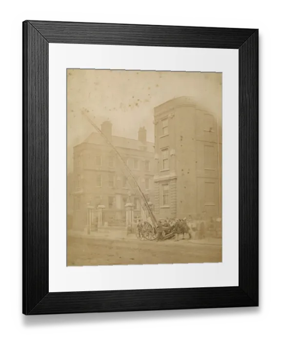 Framed Print : Firefighters in action in a street with a wheeled ladder Framed Print : Firefighters in action in a street with a wheeled ladder