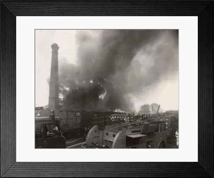 Framed Print : Warehouse on fire near railway line Framed Print : Warehouse on fire near railway line