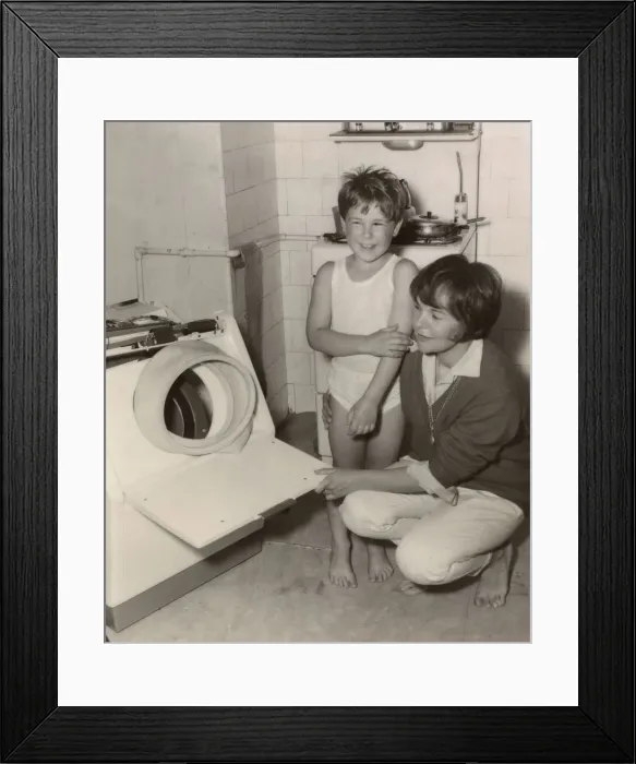 Framed Print : Woman and boy in a kitchen Framed Print : Woman and boy in a kitchen