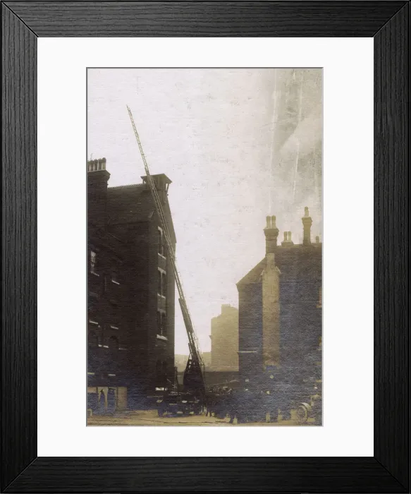 Framed Print : London Fire Brigade operating extended ladder Framed Print : London Fire Brigade operating extended ladder