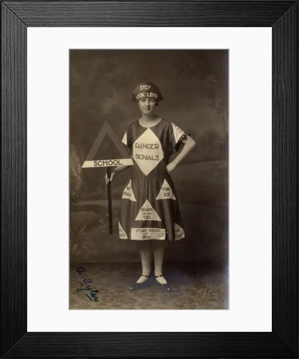 Framed Print : Fancy Dress, 1920s - Woman dressed as a road crossing Framed Print : Fancy Dress, 1920s - Woman dressed as a road crossing