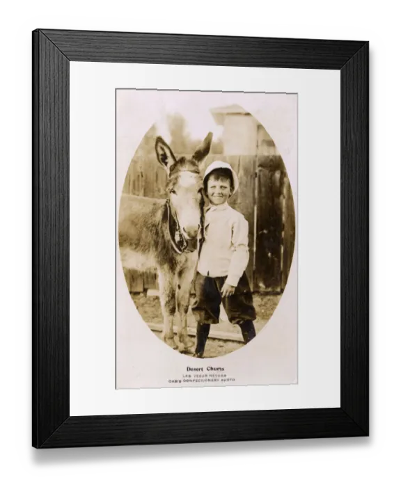 Framed Print : Desert Chums, boy and donkey, Las Vegas, Nevada, USA Framed Print : Desert Chums, boy and donkey, Las Vegas, Nevada, USA
