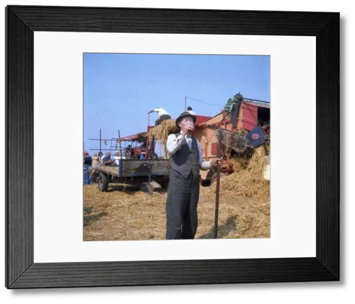 Framed Print : Elderly farmhand at harvest time Framed Print : Elderly farmhand at harvest time