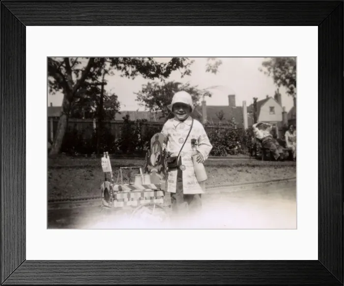 Framed Print : Little girl dressed up as a milk delivery person Framed Print : Little girl dressed up as a milk delivery person